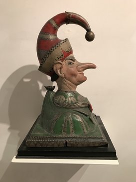 Turn of the century American Folk Art carved polychromed Punch counter top trade figure.